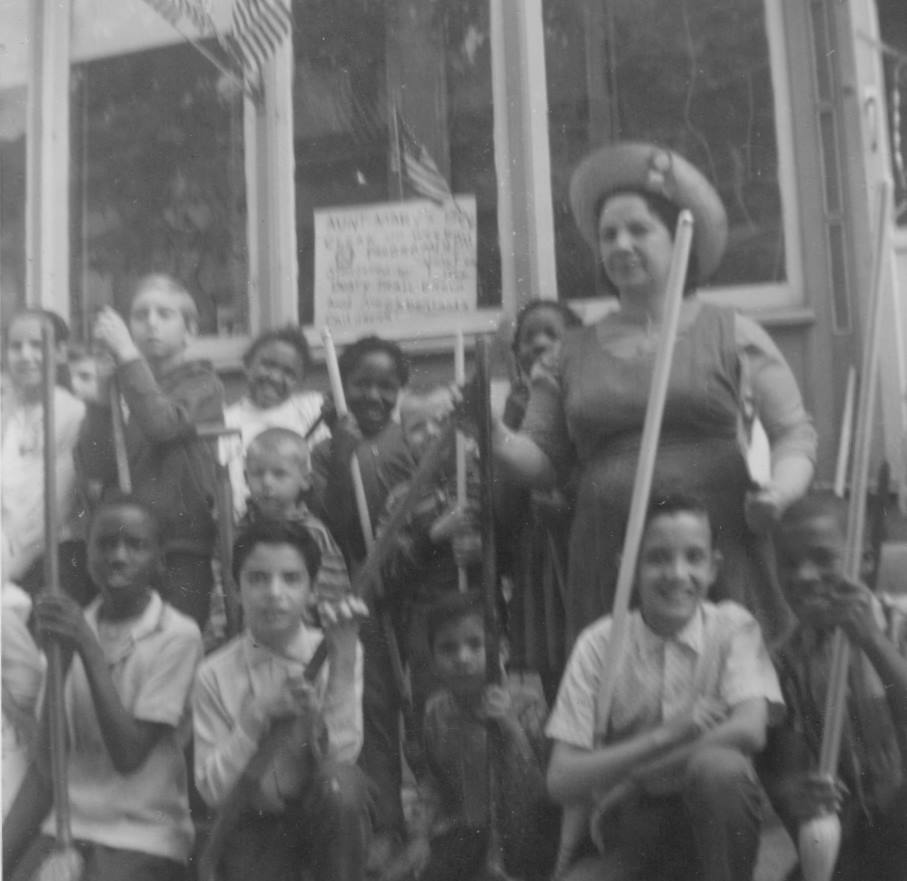 Cassady Elementary School students and teacher with brooms at cleanup event, May 1964