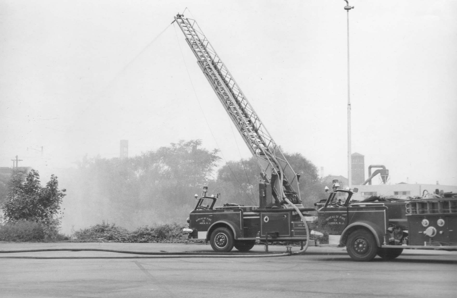 Preparing apparatus for public display — Ladder Company 3, Engine Company 9