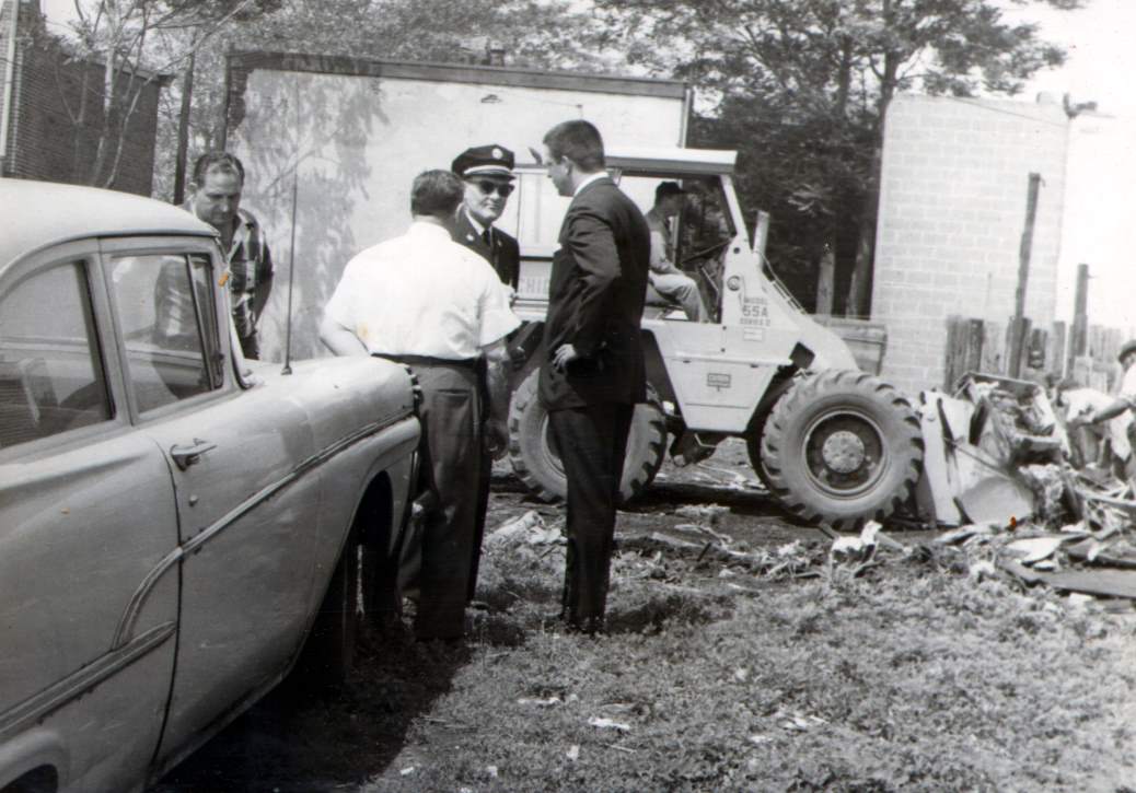 Director of Public Safety Keith Kauffman and others discussing the situation, 1967