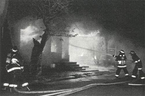 Fire scene with heavy fire conditions and exposure problems, 7th and Mt. Vernon Streets, May 15, 1997