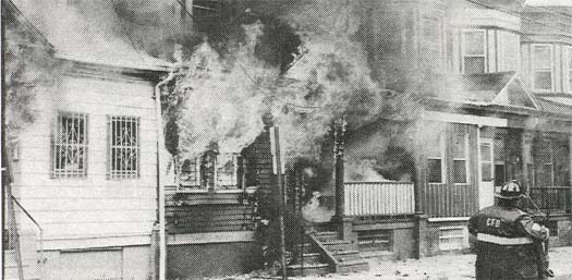 Fire with heavy fire conditions and reports of people trapped, North 8th Street
