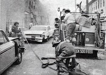 Engine Co. 9 stretching an additional line at 2200 block of Westminster Avenue, July 8, 1972