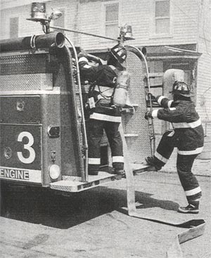 Engine Company 3 laying-in to supply Engine Company 10, dwelling fire at 25 South 7th Street, June 9, 1995