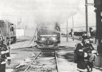 On March 11, 1996, a diesel locomotive burns at the Conrail Pavonia Rail Yard at 16th and River Road