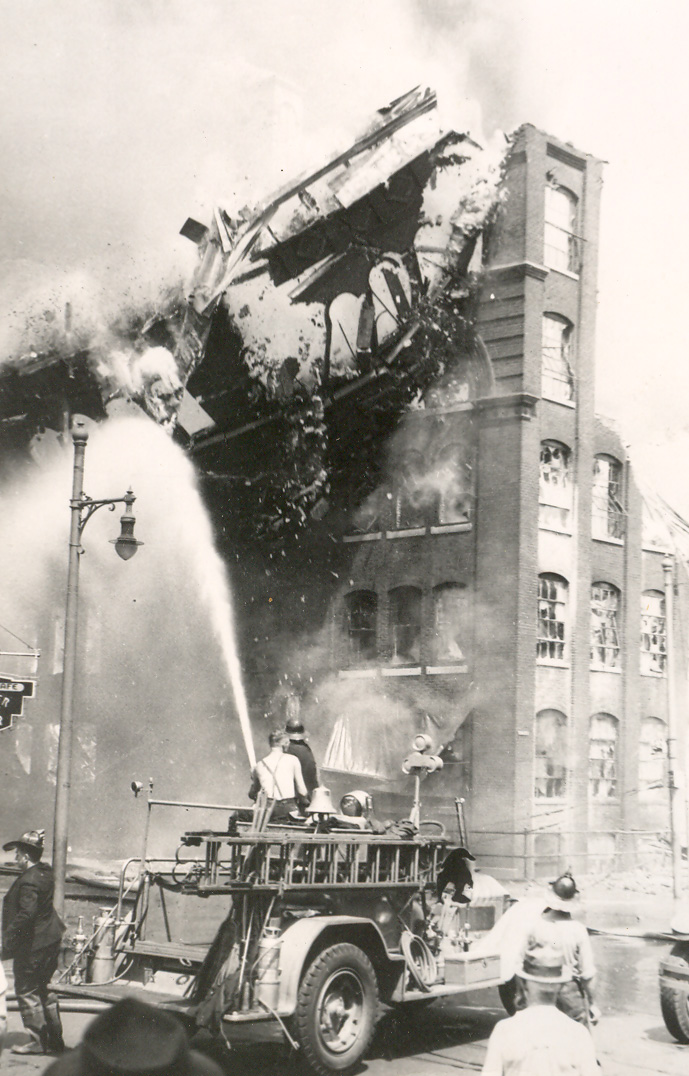 Another factory wall crumbles during the Hollingshead fire, Camden, NJ