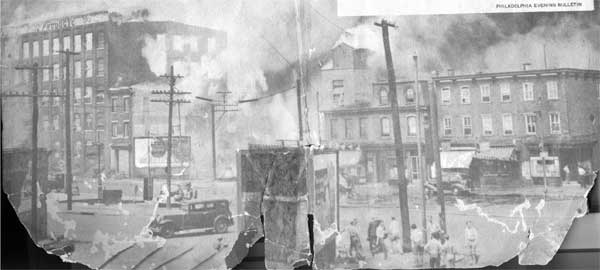 Looking northwest on Market Street from the Main Street railroad tracks — Hollingshead fire, Camden, NJ