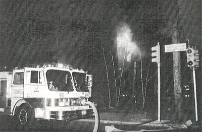 Heavy fire showing from rear of dwelling at Broadway and Van Hook Street, April 13, 1996