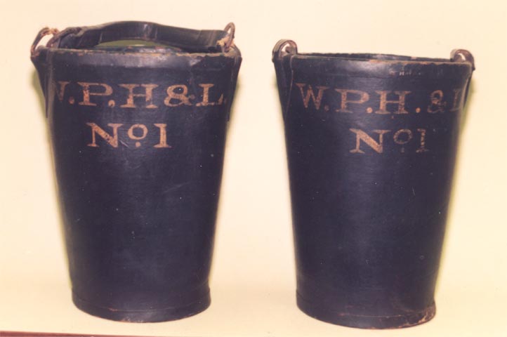 Fire buckets carried on the ladder apparatus of the William Penn Hook & Ladder Company No. 1 of Stockton, New Jersey