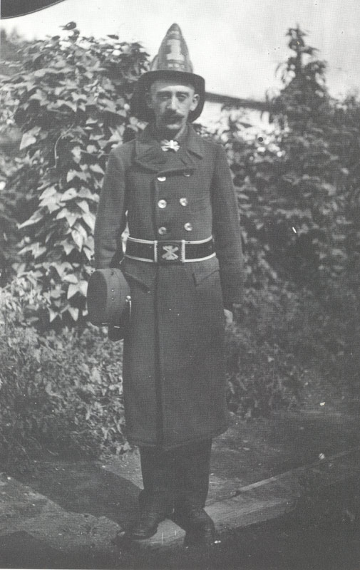 Unknown member of the William Penn Hook & Ladder Company No. 1 in parade dress uniform, 1890s