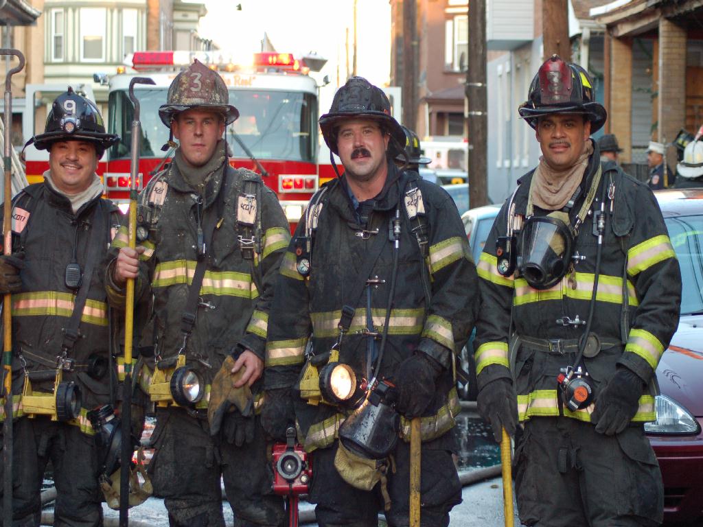 Members of Ladder Company 3 and Engine 9 looking west on Grant Street — December 1, 2007