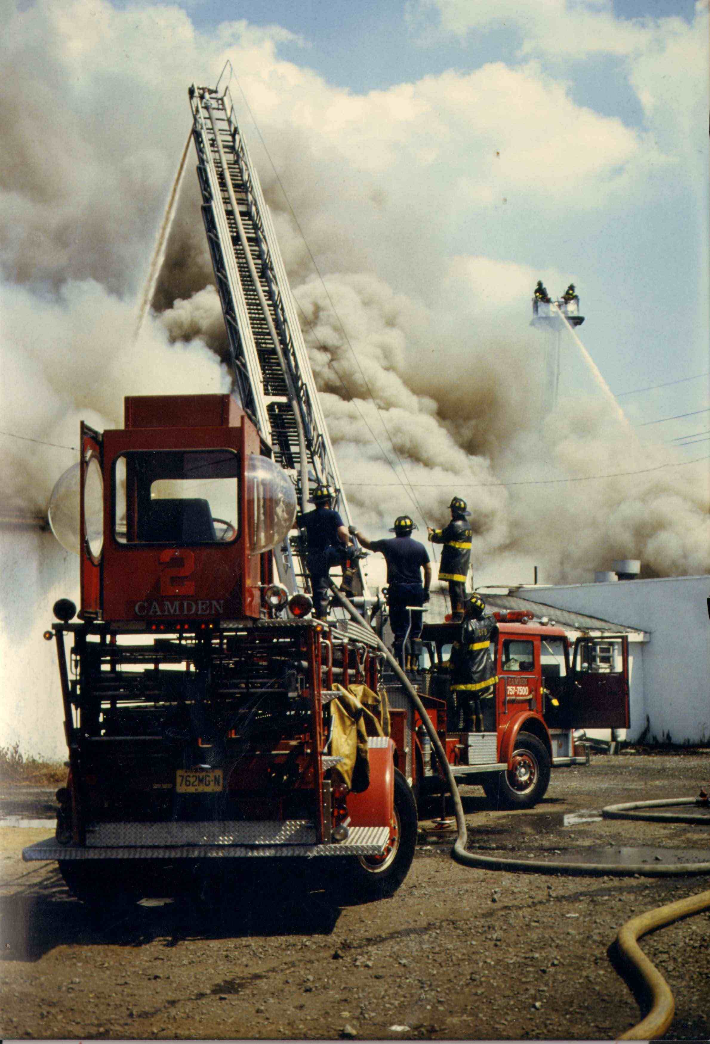 Ladder 2 at rear of meat packing plant at Broadway and Jackson Street, June 30, 1990