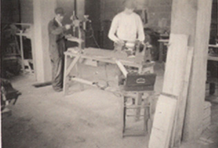 Joiner in woodworking shop