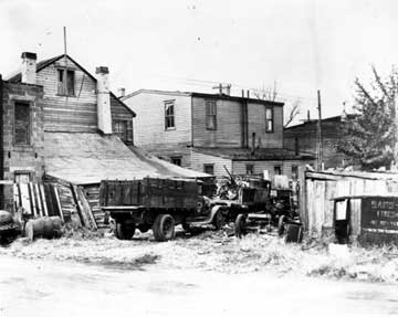 Dilapidated housing in the Branch Village site, Camden, 1938