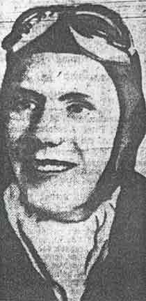 Portrait of Aviation Cadet Edward C. Hill Jr. in flight gear