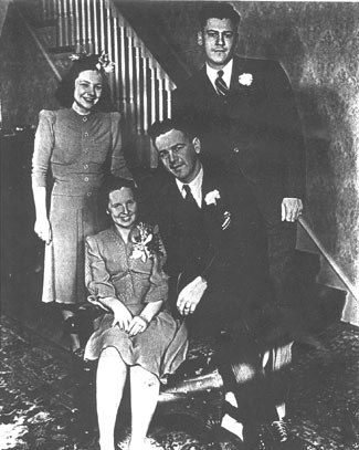 Wedding reception: seated, Kay and Matt Sippel; standing, bridesmaid Helen Rosiecki and best man Will Sippel