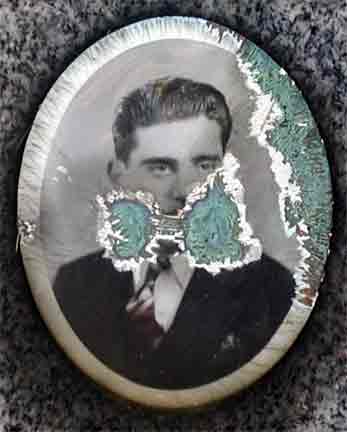 John J. D'Agostino, portrait photograph on grave