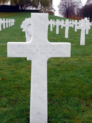 Gravestone of Technical Sergeant Alden P. Cochran at Henri-Chapelle American Cemetery
