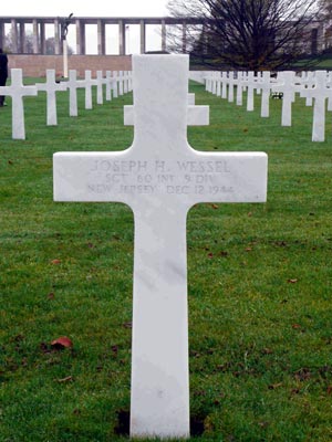 Gravestone of Sergeant Joseph H. Wessel at Henri-Chapelle American Cemetery, Belgium