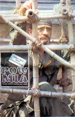 Karl Sherrer of Gloucester City portrays a prisoner of war at a dedication ceremony for the Camden County POW/MIA Memorial in Lindenwold