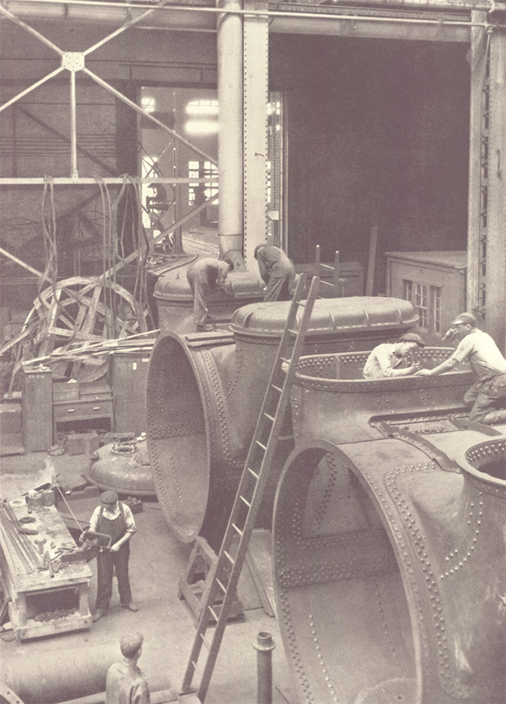 Workers at work on condenser shells for the two 32,000-ton battleships, New York Shipbuilding Corporation, 1921