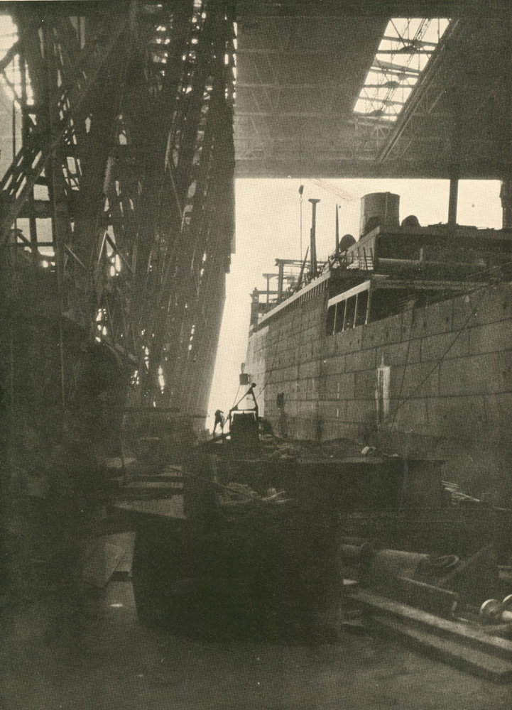Outfitting one of sixteen 21,000-ton passenger liners in the covered wet slip, New York Shipbuilding Corporation, 1921