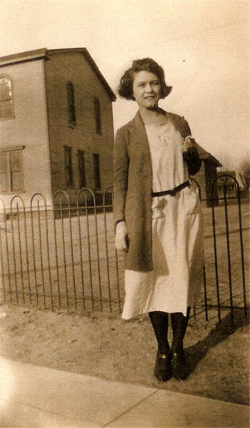 Lauraine Atger, with St. Joseph's Roman Catholic Church in the background