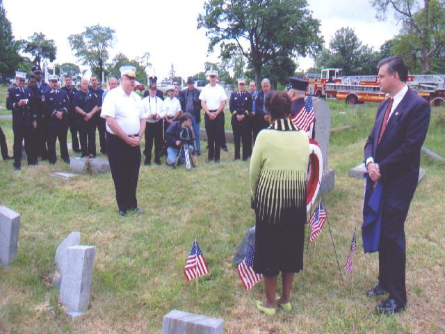 Camden Fire Chief Joseph Marini speaking at the ceremony