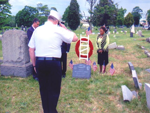 Chief of the Department Joseph Marini gives a final farewell salute to Fireman William Hillman