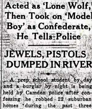 Camden Courier-Post, January 24, 1938 — Detectives Clifford Carr and Clarence Arthur examining recovered guns and valuables