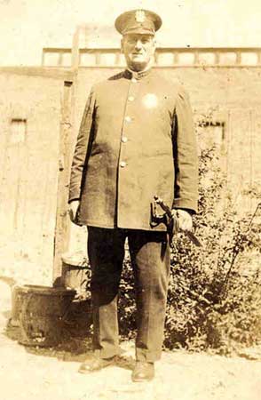 Camillus V. Appley in police uniform
