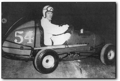 George Sweeten at the wheel of his race car