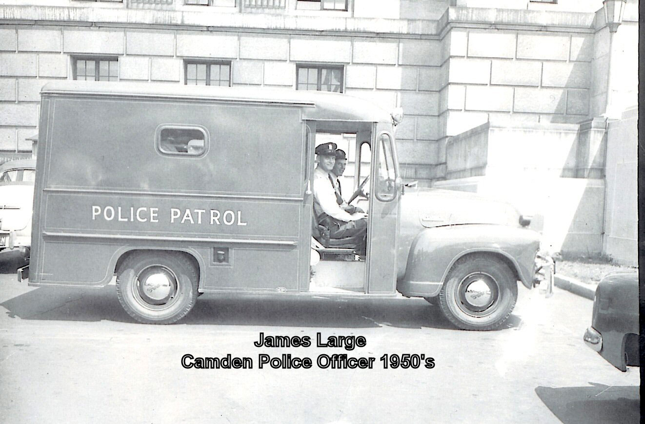 James Large in a Camden Police Patrol wagon, 1950s