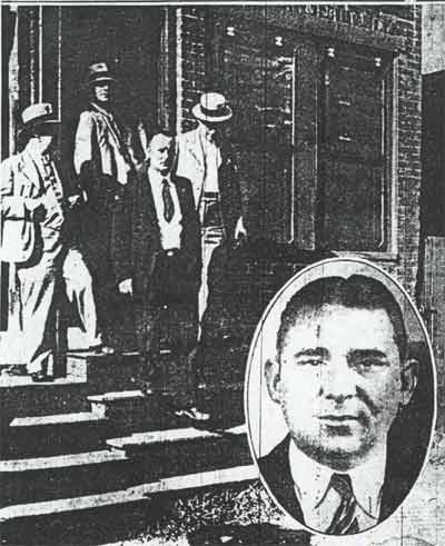Police Chief Arthur Colsey and detectives leaving 242 Sycamore Street