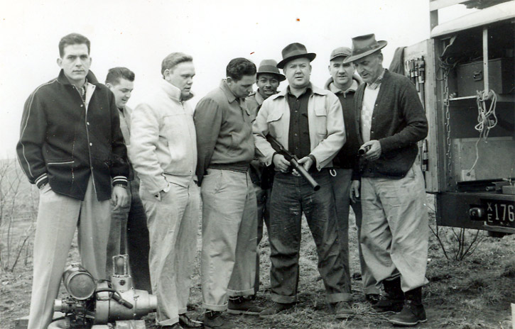 Teargas gun instruction — William Schultz at far right