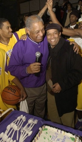 Clarence Turner congratulated by Dr. Roy Dawson after 700th win