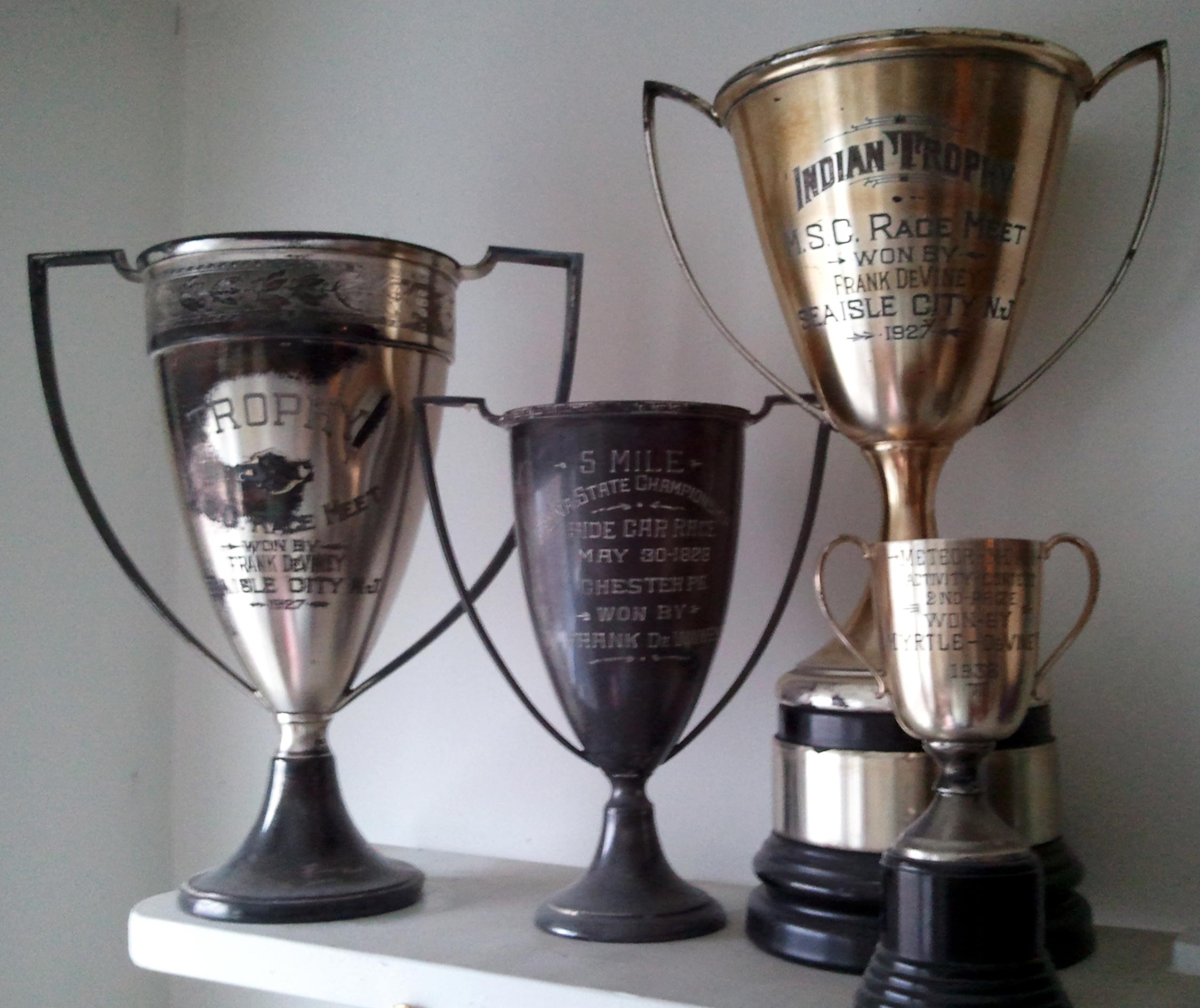 Motorcycle trophies awarded to Frank and Myrtle DeViney