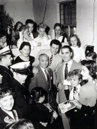Barney Ross (in grey suit), Eddie Fisher, and Tommy Skymer