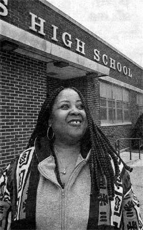 Carla Benson outside Brimm Medical Arts High School