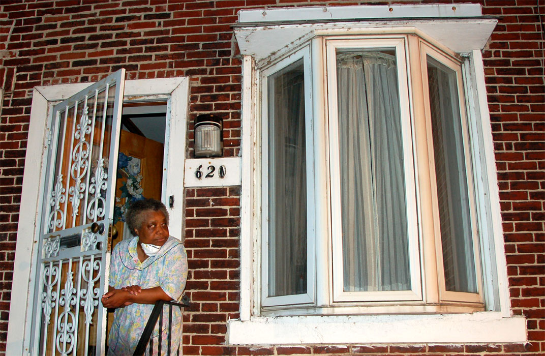 Radiant heat from the fire across the street broke the center pane of the window and melted the house numbers