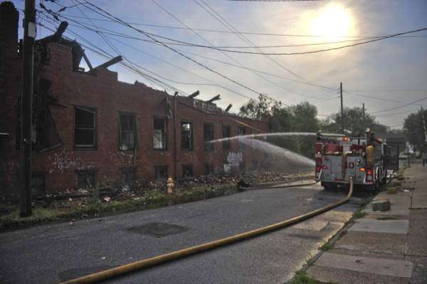 Clement Coverall fire — Courier-Post, July 6, 2011