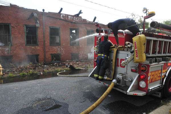 Clement Coverall fire — Courier-Post, July 6, 2011