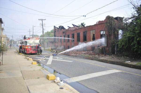 Clement Coverall fire — Courier-Post, July 6, 2011