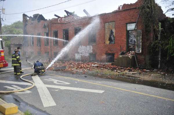 Clement Coverall fire — Courier-Post, July 6, 2011