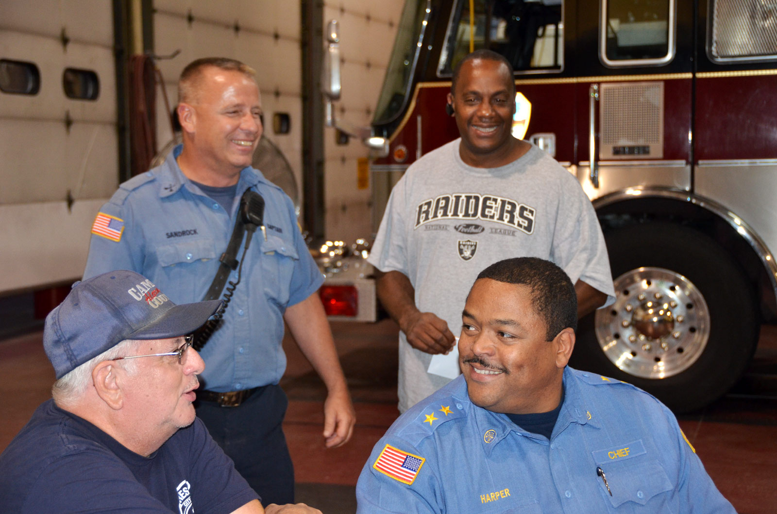 Standing: Frank Sandrock, Anthony Church; Sitting: Dom Patrocelli, Chief of Department Mike Harper
