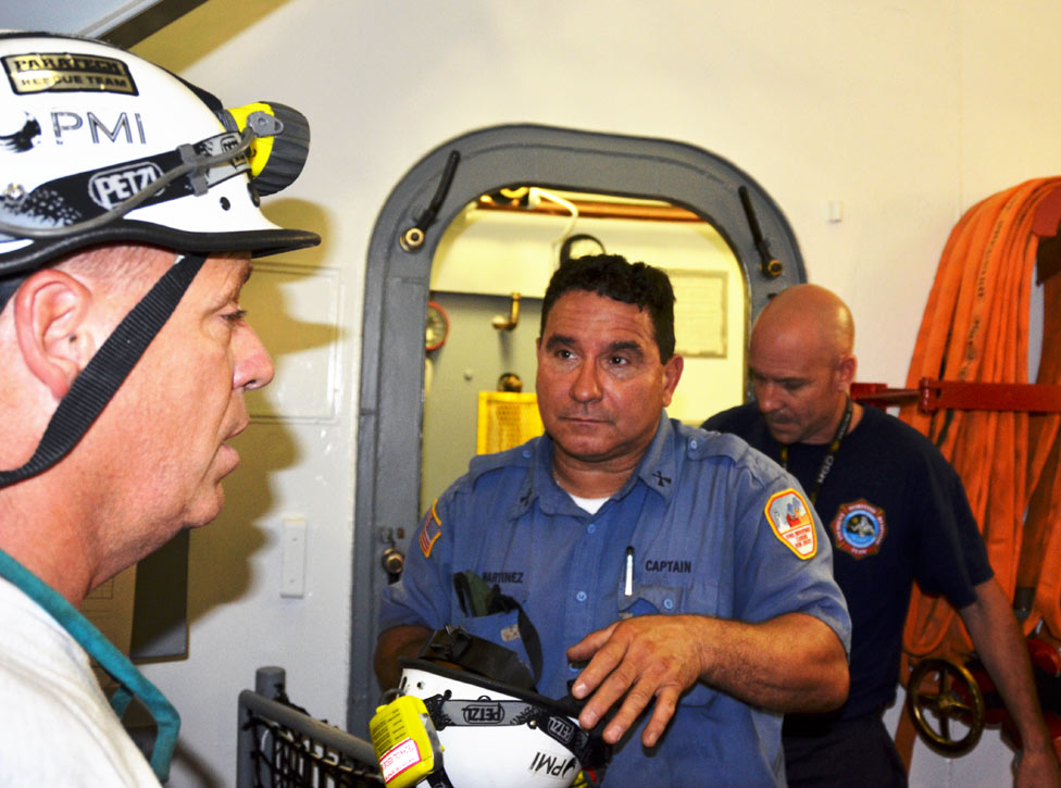 Frank Sandrock, Manny Martinez, Battalion Chief Don Johnson