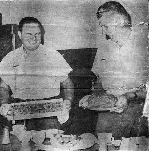 Joseph Dowhy and Theodore Orbaczewski cooking at Engine Company 11 firehouse, 1963