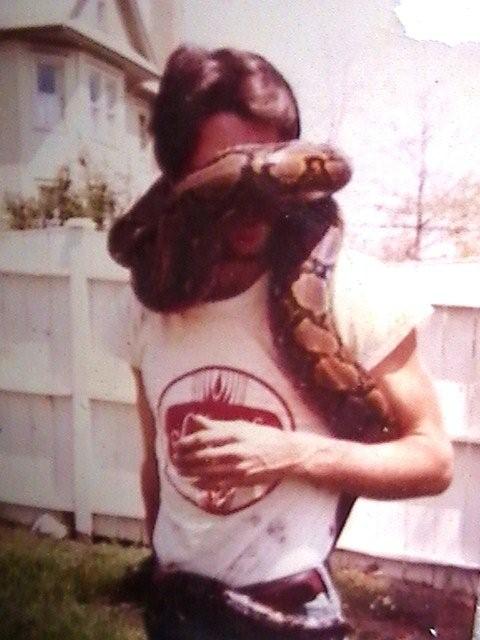 Steamhorse the python wrapped around Joe Seddon's waist