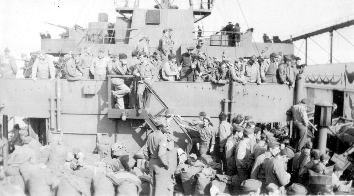 Troops boarding a transport vessel, World War II