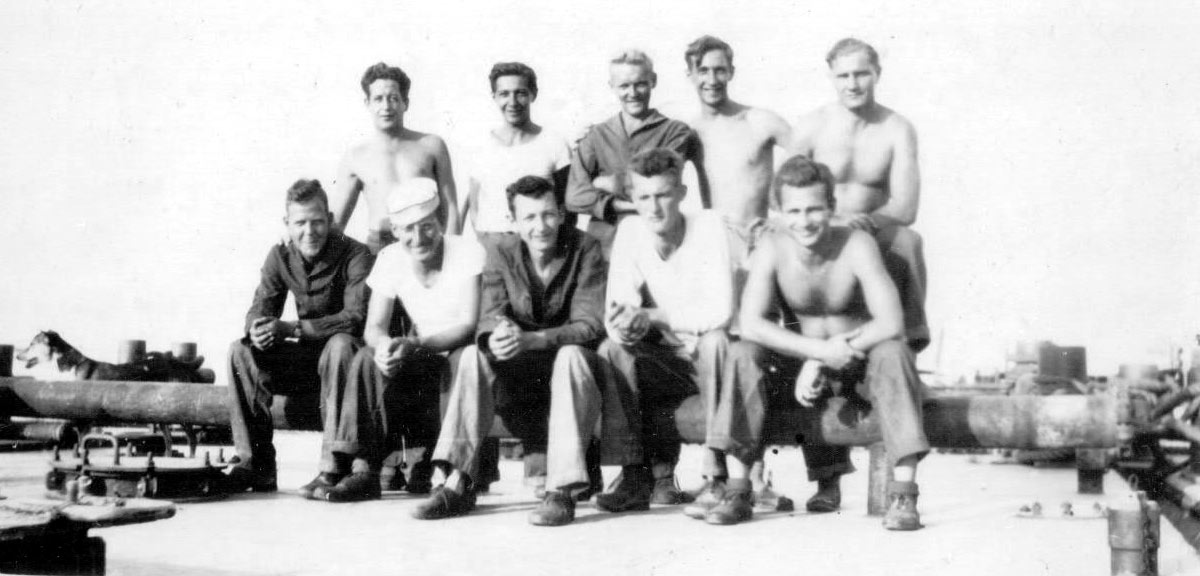 James J. Cusick Sr. with crewmates on deck of river patrol craft, India, World War II