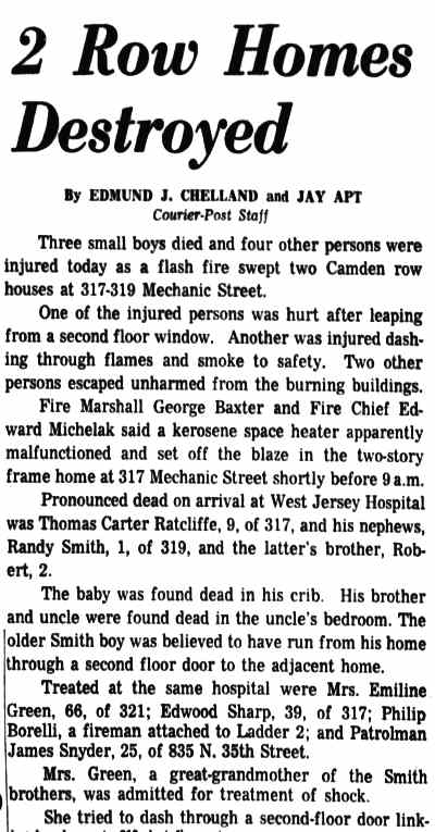 Shroud-covered body of one of three boys who died in row house fire on Mechanic Street near 4th Street